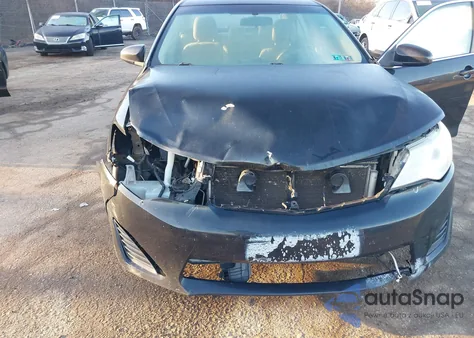 2014 Toyota Camry Le z USA, uszkodzony, nr VIN 4T4BF1FK7ER372099